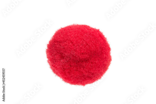 Red pompom isolated photo