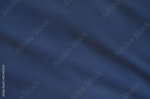 Dark blue textile background. Navy blue abstract background. Space for text.