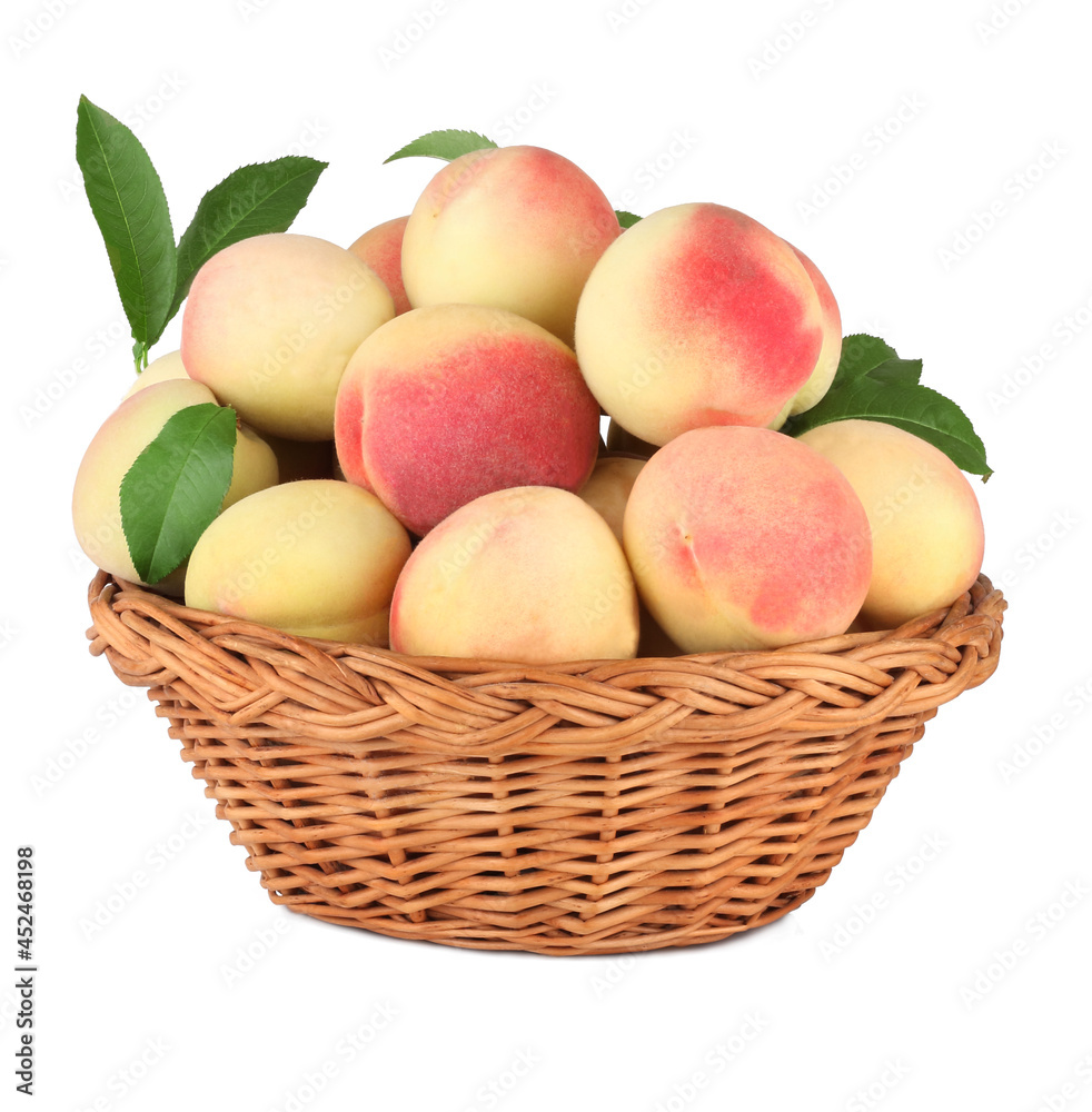 Peaches in basket isolated on a white background
