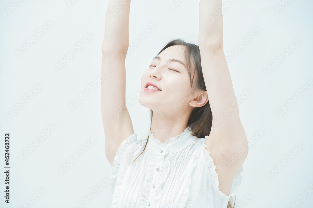 Young woman taking a deep breath Young woman taking a deep breath
