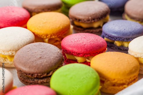 many macaroons on white table