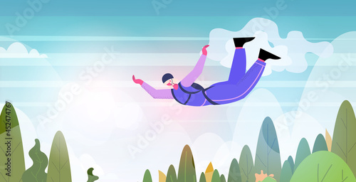 senior woman flying down during skydiving jump aged skydiver floating in air with parachute freefall active old age