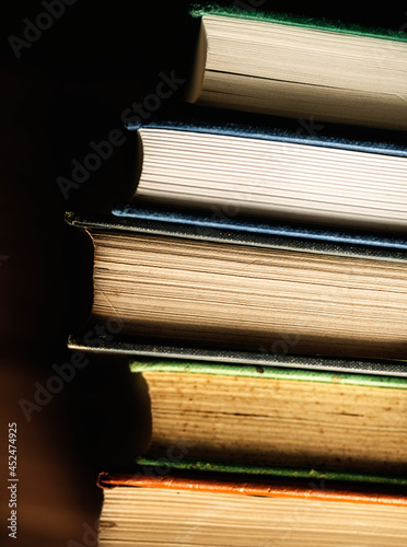 Closeup of stack of antique books educational, academic and literary concept