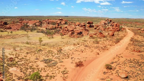 Panorama Of Granite Rocks At The Savannah In Devils Marbles Conservation Area In Australia. aerial photo