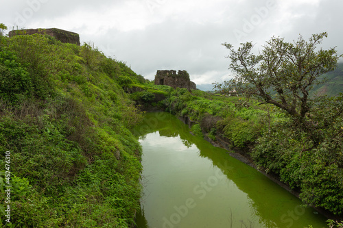 One of the two rock cut water cisterns on the top of Hatgad fort  Nashik  Maharashtra  India. The water is available round the year