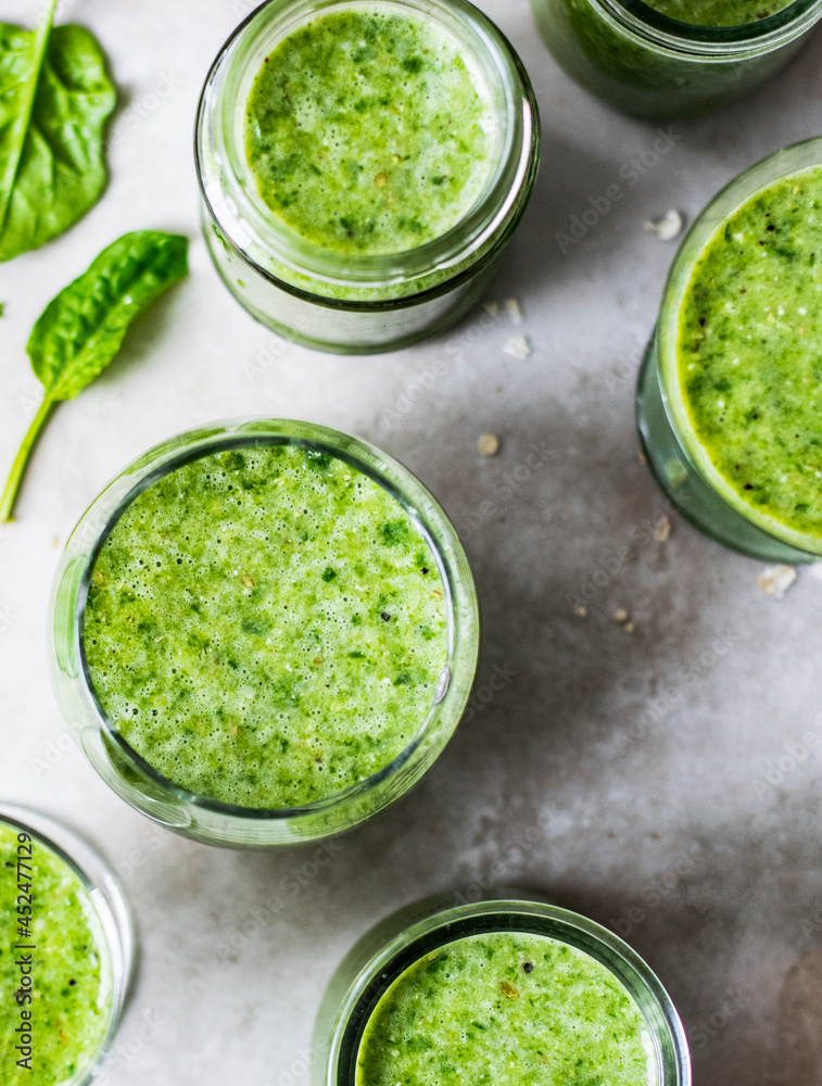 Fresh green smoothie in glasses Fresh green smoothie in glasses