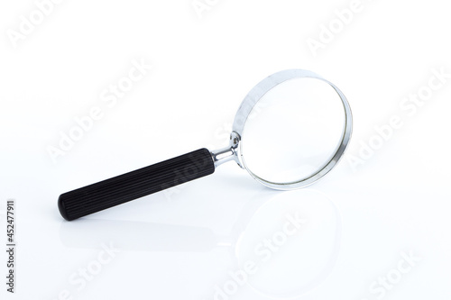 Magnifying glass on the white background