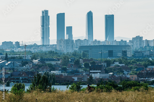 Closeup shot of the Cuatro Torres Business Area in Madrid, Spain photo