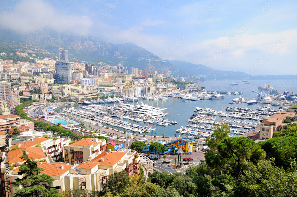 Panoramic view of Monte Carlo harbor in Monaco. Port Hercules. Yachts in the port. Aerial view, cityscape.