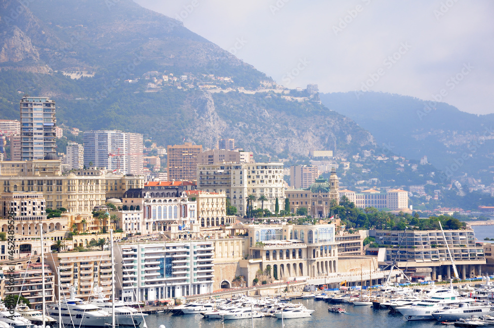 Monte Carlo harbor in Monaco. Port Hercules. Yachts in the port. Aerial view, cityscape.
