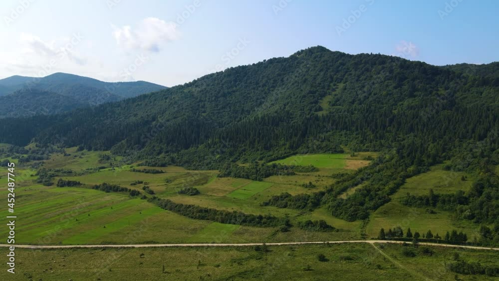 Сinematic aerial view of the endless mountains and forests of southern Slovenia. Drone flying through the forest Сinematic aerial view of the endless mountains and forests of southern Slovenia. Drone flying through the forest