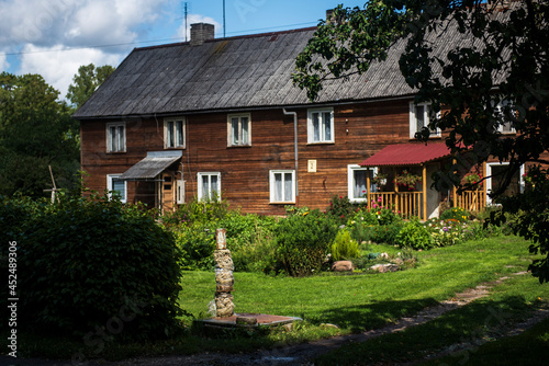 Old historical house and pump in Valdemarpils town, Latvia. photo