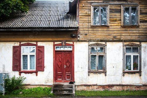 Old historical house and cat in Valdemarpils town, Latvia. photo