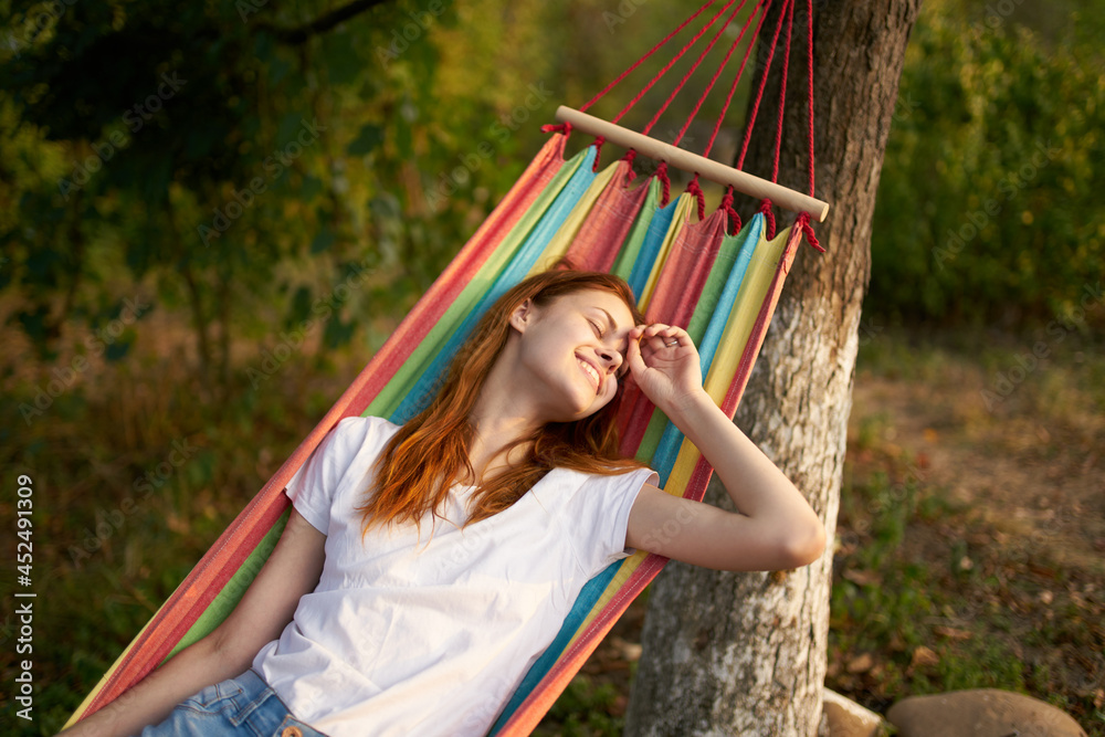 pretty woman lies in a hammock outdoors nature trees pretty woman lies in a hammock outdoors nature trees