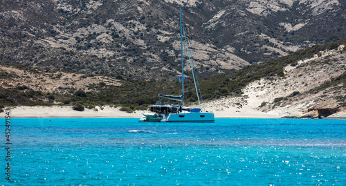 Fototapeta Naklejka Na Ścianę i Meble -  Polyaigos volcanic white sand beach turquoise sea blue sky at Kimolos island, Cyclades Greece.