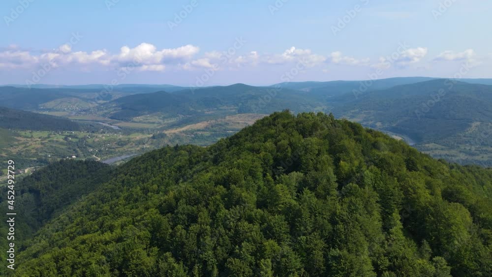 Сinematic aerial view of the endless mountains and forests of southern Slovenia. Drone flying through the forest Сinematic aerial view of the endless mountains and forests of southern Slovenia. Drone flying through the forest