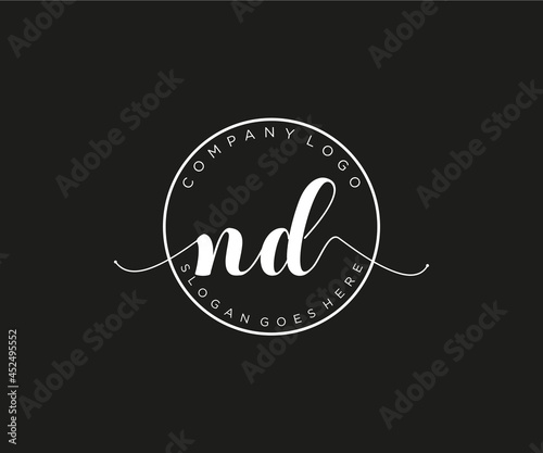 initial ND Feminine logo beauty monogram and elegant logo design, handwriting logo of initial signature, wedding, fashion, floral and botanical with creative template. photo