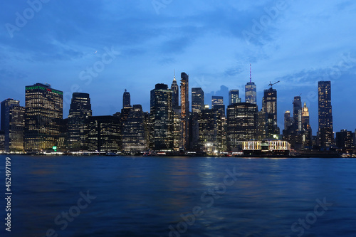 Manhattan skyline over river © Tatty