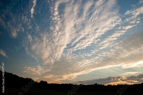 Cirrocumulus and cumulus clouds photo