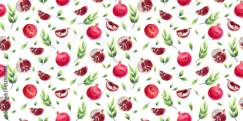 Seamless pattern with red, ripe pomegranate, seeds, fruits and green leaves isolated on a white backgroundfor textile, wrapping paper. Watercolor botanical hand painted illustration.