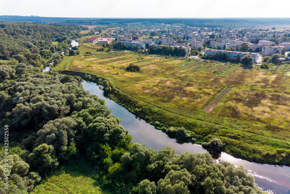 Aerial view from the Protva river to the city of Ermolino, Borovsky district, Kaluzhskiy region, Russia - August 2021