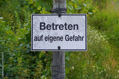 Canvas-taulu German warning sign Betreten auf eigene Gefahr, which means enter at your own