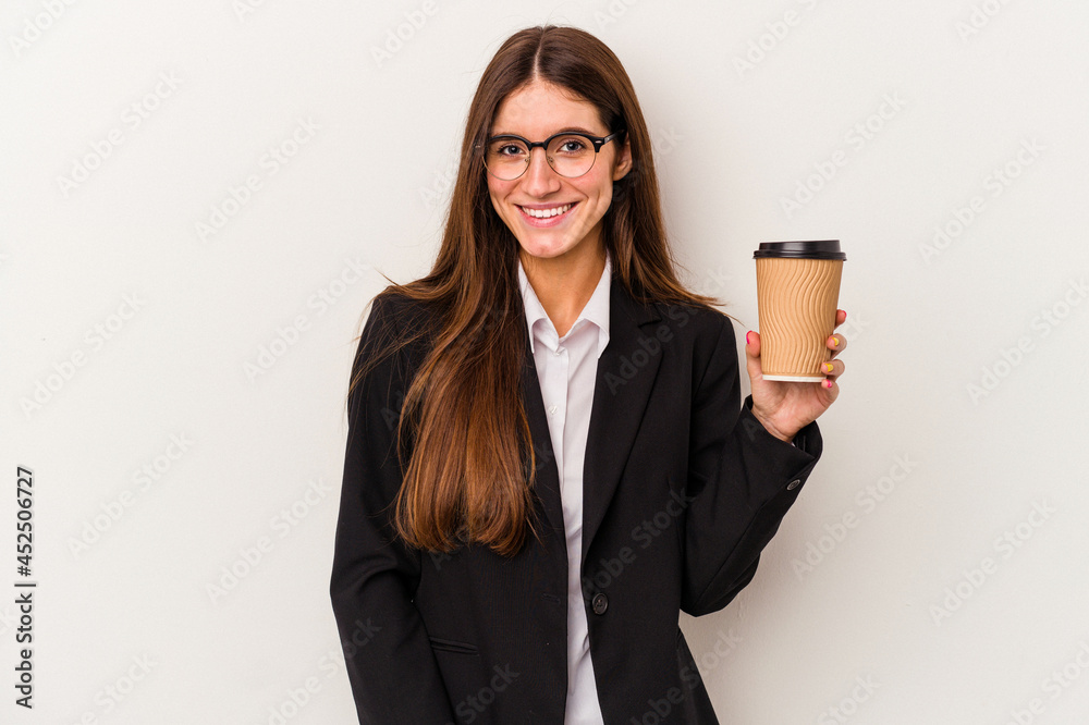 Young caucasian business woman holding a takeaway coffee isolated on white background happy, smiling and cheerful. Young caucasian business woman holding a takeaway coffee isolated on white background happy, smiling and cheerful.
