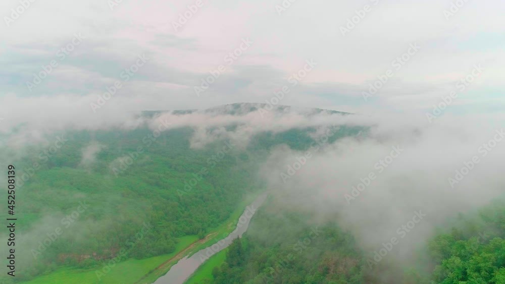 Aerial video of clouds, mountains, forest and mountain river Aerial video of clouds, mountains, forest and mountain river