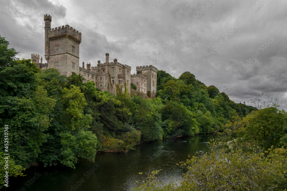 Lismore Castle on the bank of the River Blackwater on a typical Irish day