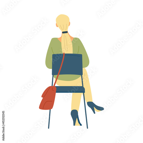 Casual woman with long blonde hair sitting on chair in flat vector illustration