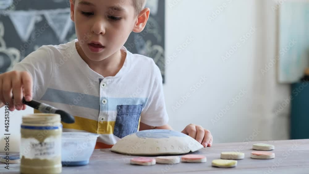 workshop for kids. Children learning how to use clay for making beautiful dishes. Workshop, master class. workshop for kids. Children learning how to use clay for making beautiful dishes. Workshop, master class.