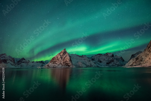 Background, beautiful northern lights in the night sky in Iceland. © MAGNIFIER