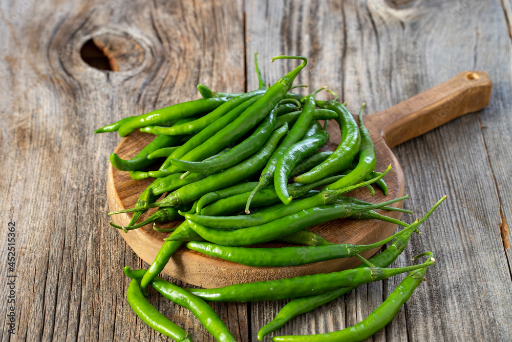 fresh ripe green pepper on wood background fresh ripe green pepper on wood background