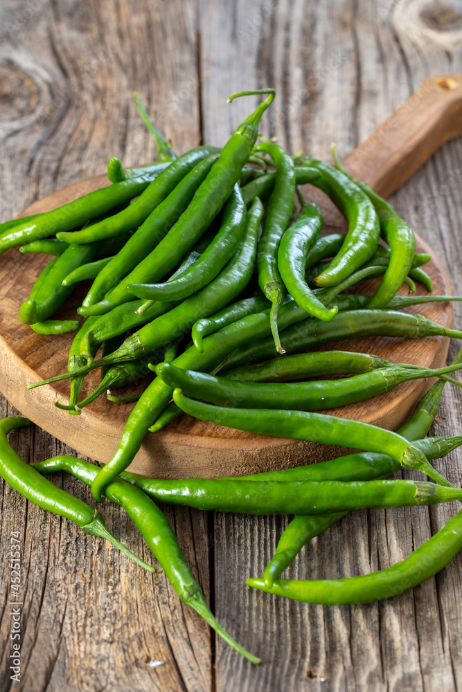 fresh ripe green pepper on wood background fresh ripe green pepper on wood background