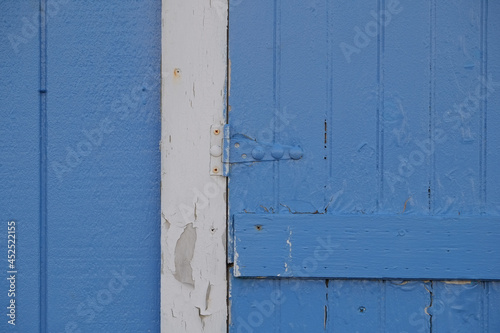 Colorful coastal blue door in a coastal New England Town