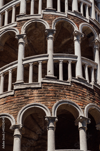 Vertical shot of the details of the Scala Contarini del Bovolo in Venice, Italy photo