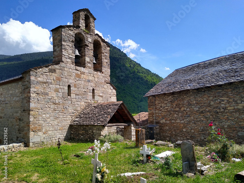 UNESCO World Heritage.
Romanesque church of Santa Maria in the village of Cardet. Main facade with bell gable. (12 century). Valley of Boi. Spain.   photo