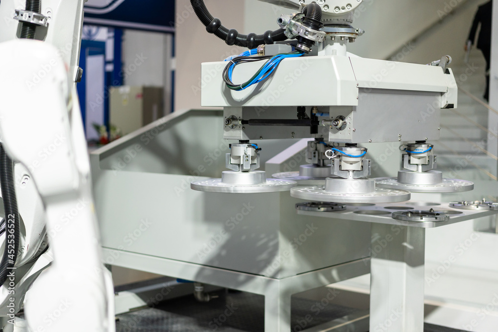 robot arm working in factory robot arm working in factory