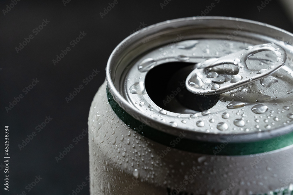 open aluminum can of drink. close-up. bar. open aluminum can of drink. close-up. bar.