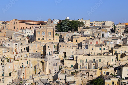 Matera, Italy - August 17, 2020: View of the Sassi di Matera a historic district in the city of Matera, well-known for their ancient cave dwellings. Basilicata. Italy © Salvatore