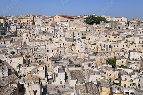Matera, Italy - August 17, 2020: View of the Sassi di Matera a historic district in the city of Matera, well-known for their ancient cave dwellings. Basilicata. Italy © Salvatore