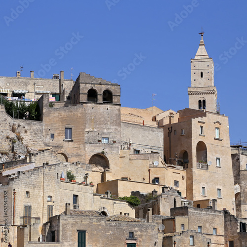 Matera, Italy - August 17, 2020: View of the Sassi di Matera a historic district in the city of Matera, well-known for their ancient cave dwellings. Basilicata. Italy