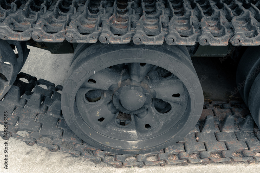 Rusty tracks of an old Russian tank. Wheels and tracks of a Soviet tank