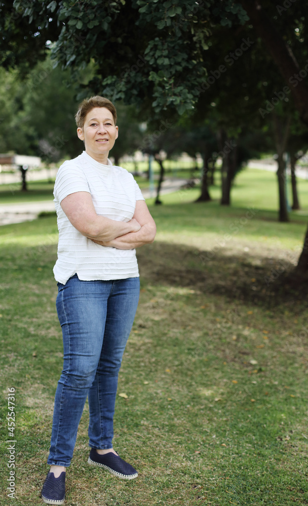 Outdoor portrait of 50 years old woman