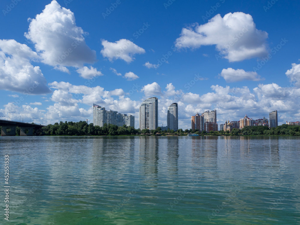 Beautiful summer landscape on the Dnieper river  with the city view. Ukraine, Kyiv