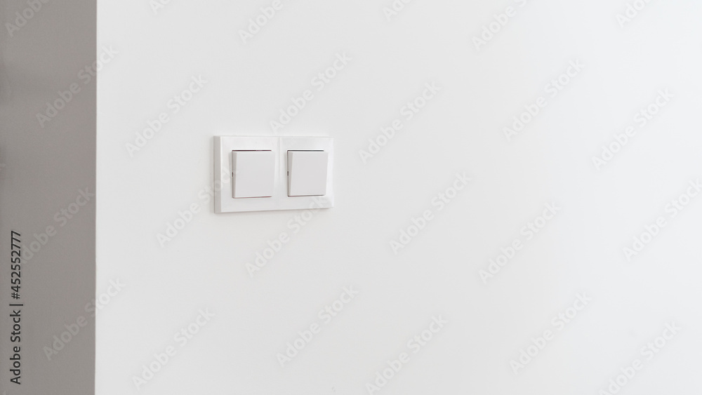 Switch light at wall, closeup to interior details. Switch light at wall, closeup to interior details.