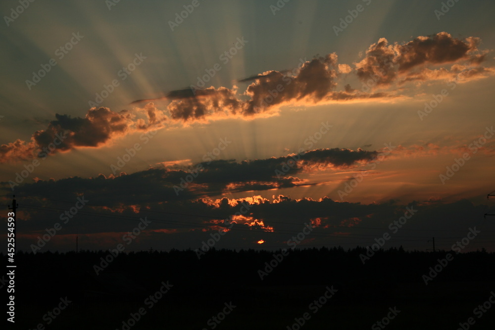 Sunset behind the clouds Sunset behind the clouds