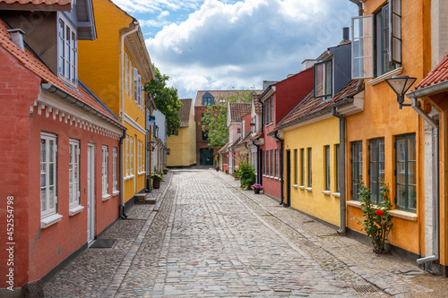 Odense, Denmark  Aug 2, 2021 - The world famous writer Hans Christian Andersen's iconic yellow childhood home. The building is now a museum of the poet's personal belongings. © Nick Brundle