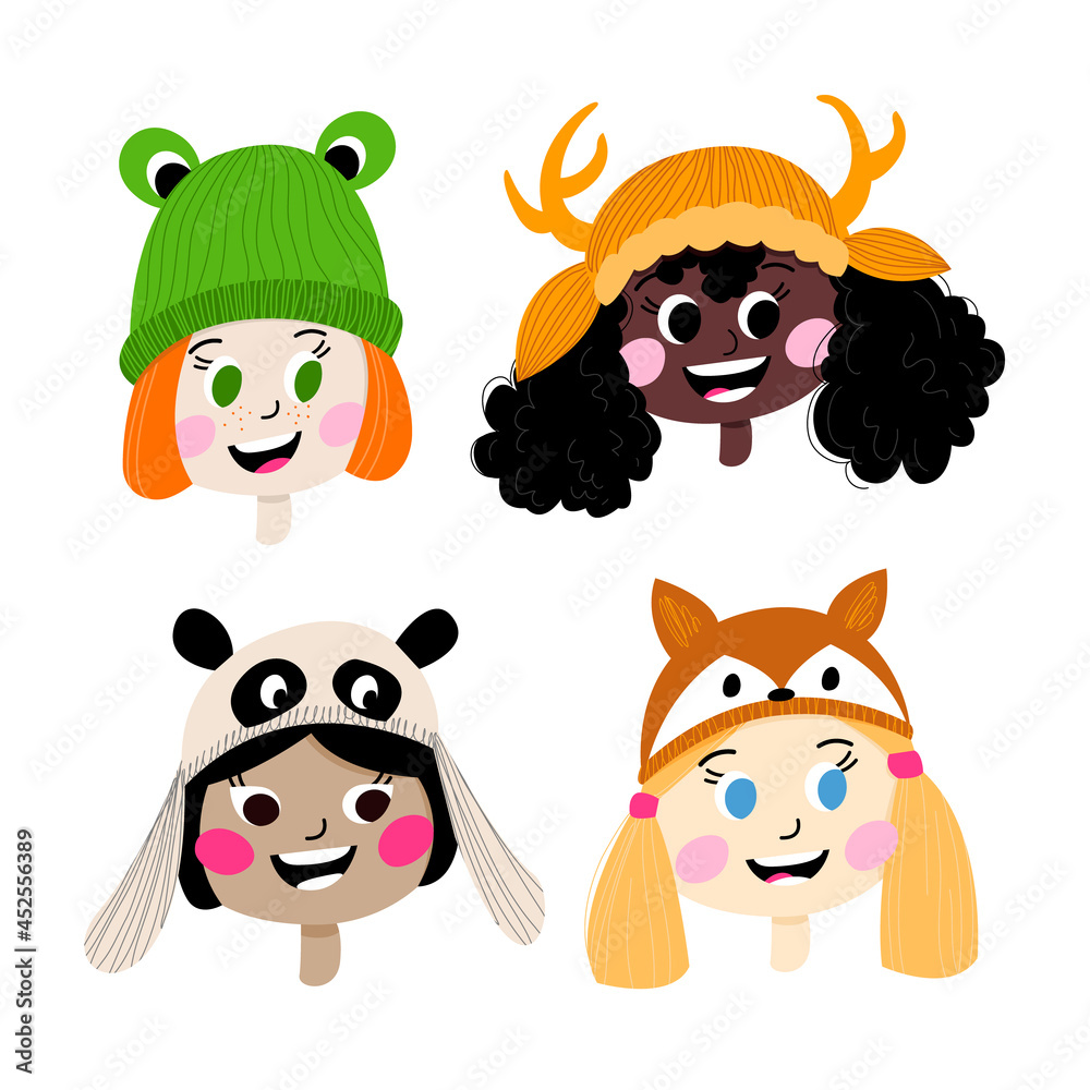 Cute faces of children of different nationalities in funny winter hats in the form of animals Cute faces of children of different nationalities in funny winter hats in the form of animals