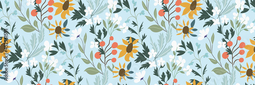 Fresh floral pattern with wildflowers on a light blue background. Vector seam...